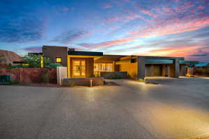 View of front facade with stucco siding