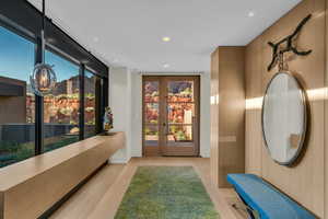 Hallway featuring recessed lighting and light wood-style flooring
