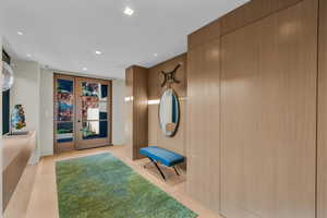 Corridor featuring recessed lighting and light wood-style flooring