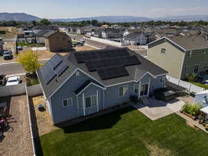 Aerial view of residential area with a mountainous background