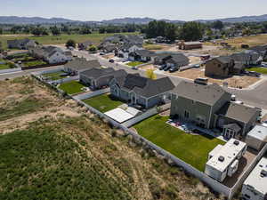 Aerial view of residential area with a mountain backdrop