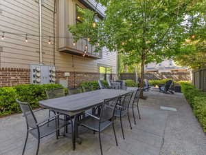 View of patio with outdoor dining space