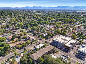 Aerial view of residential area featuring a mountain backdrop