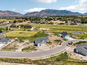 Aerial view of residential area featuring mountains
