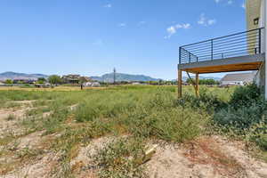 View of yard with a mountain view