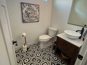 Bathroom featuring vanity and tile patterned flooring