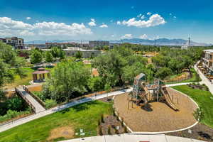 Drone / aerial view of a mountainous background and a recreational park