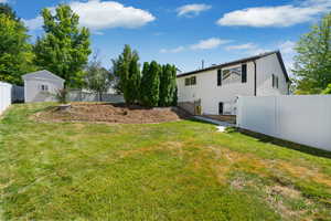 View of yard with a shed