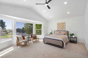 Bedroom featuring carpet floors, recessed lighting, vaulted ceiling, and a ceiling fan