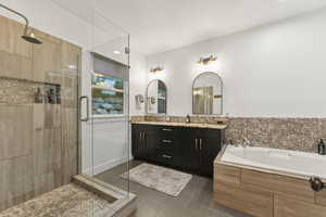Full bathroom with tiled shower, double vanity, a bath, tile patterned flooring, and recessed lighting