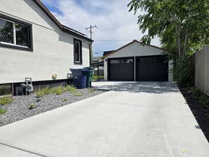 Fenced Driveway and Garage