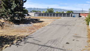 View of asphalt road featuring a mountain view