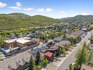 Aerial perspective of suburban area with mountains