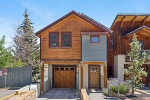 Chalet / cabin featuring a garage