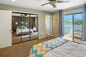 Carpeted bedroom featuring access to outside, recessed lighting, ceiling fan, and a closet