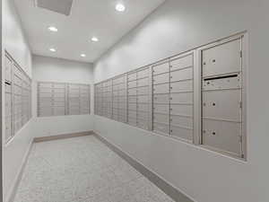 View of property's community featuring mail area and recessed lighting