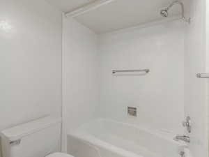 Full bathroom with bathtub / shower combination