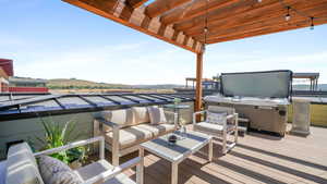 Wooden deck with an outdoor living space