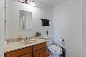 Bathroom with toilet and vanity