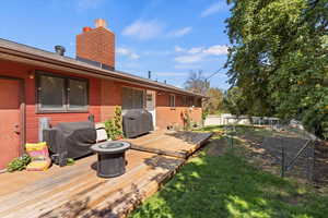 View of yard with a deck