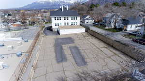 Aerial view of residential area featuring a mountainous background