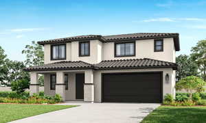 Mediterranean / spanish home with an attached garage, stucco siding, and concrete driveway