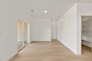 Spare room featuring recessed lighting and light wood finished floors