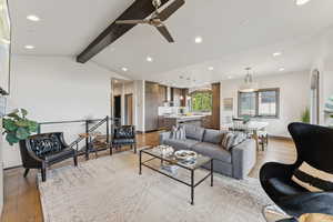 Living area with recessed lighting, light wood-type flooring, and ceiling fan