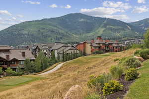 Mountain view featuring nearby suburban area