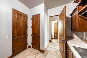 Entryway featuring baseboards
