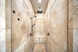 Full bath with tiled shower