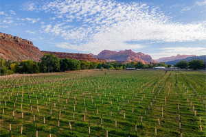 View of mountain backdrop featuring rural landscape