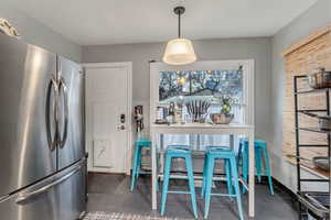 Dining room featuring tile patterned flooring