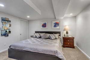 Bedroom featuring recessed lighting and carpet
