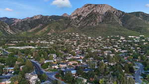 View of mountain background featuring nearby suburban area