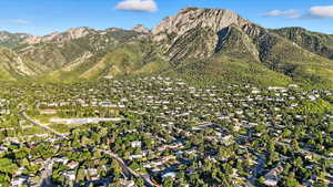 View of mountain background featuring nearby suburban area