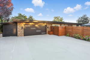 Garage with concrete driveway