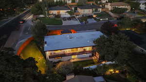 View of property location with nearby suburban area