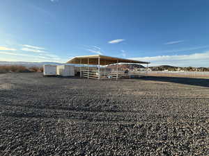 Back of property with an exterior structure and an outdoor structure