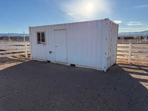 View of shed with a mountain view