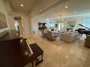 Lobby featuring ornamental molding and recessed lighting