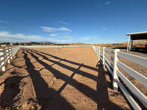 View of yard with a mountain view and a rural view
