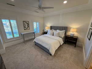 Bedroom with crown molding, carpet flooring, recessed lighting, and a ceiling fan