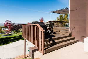 Wooden deck with a yard