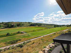 View of yard featuring view of golf course