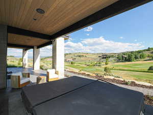 View of patio / terrace with view of golf course