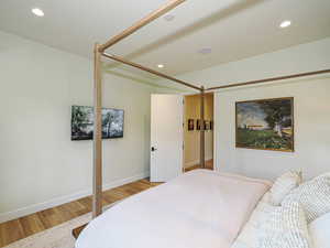 Bedroom featuring light wood-type flooring and recessed lighting