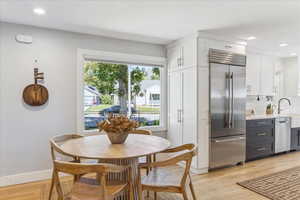 Dining space featuring recessed lighting and light wood-type flooring