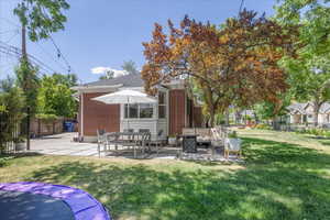 View of yard featuring an outdoor living space and a patio