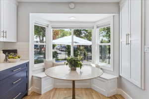 Dining room featuring breakfast area and light wood-type flooring